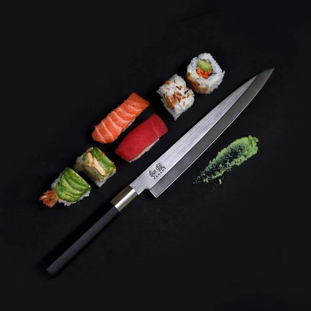 Wasabi Black yanagiba knife with sushi